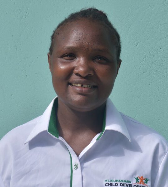 An image of Esther Mbithe, an emplyee at mkcdp